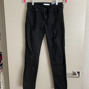 Maxwell Low Rise Distressed Skinny Jeans